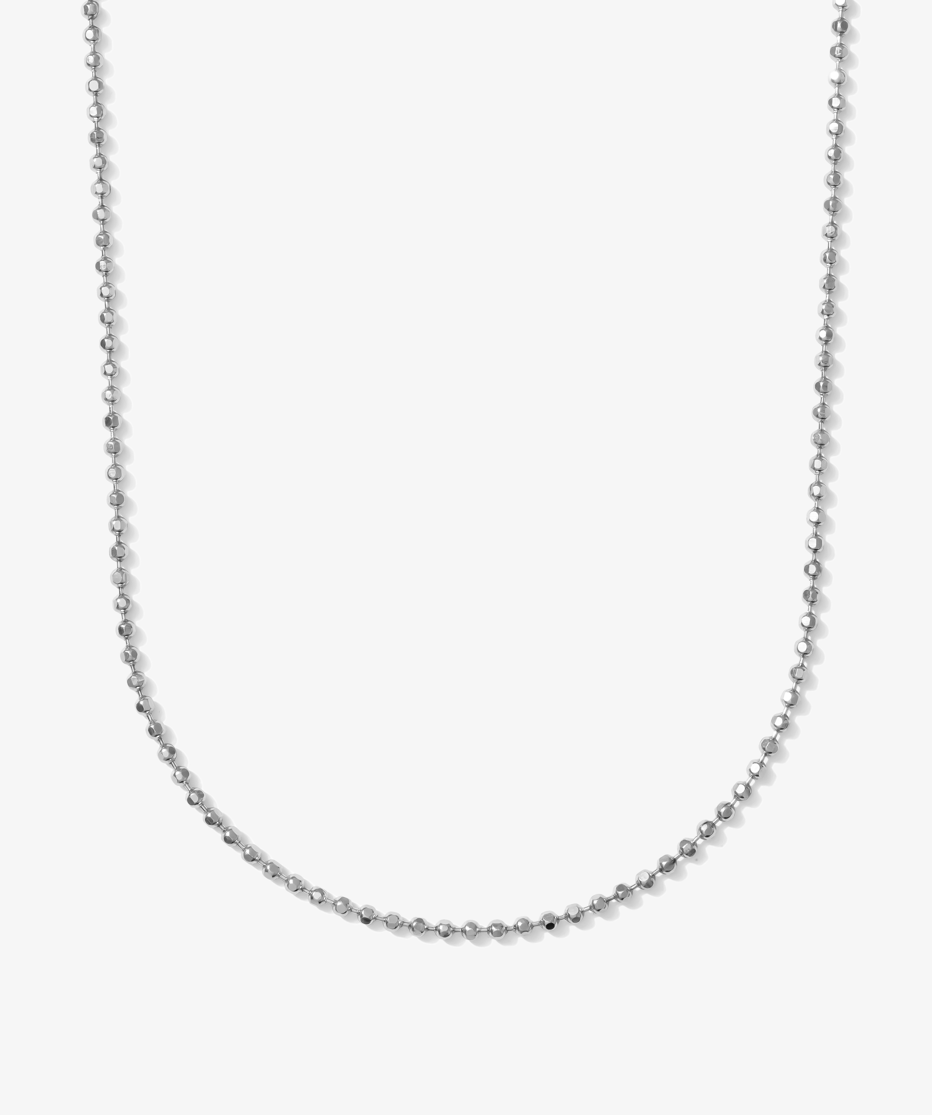 ICED London silver bead chain necklace, curved loop on a white background.