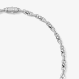 ICED London silver bracelet with pavé-linked segments and polished spherical beads, diamond-encrusted chain.