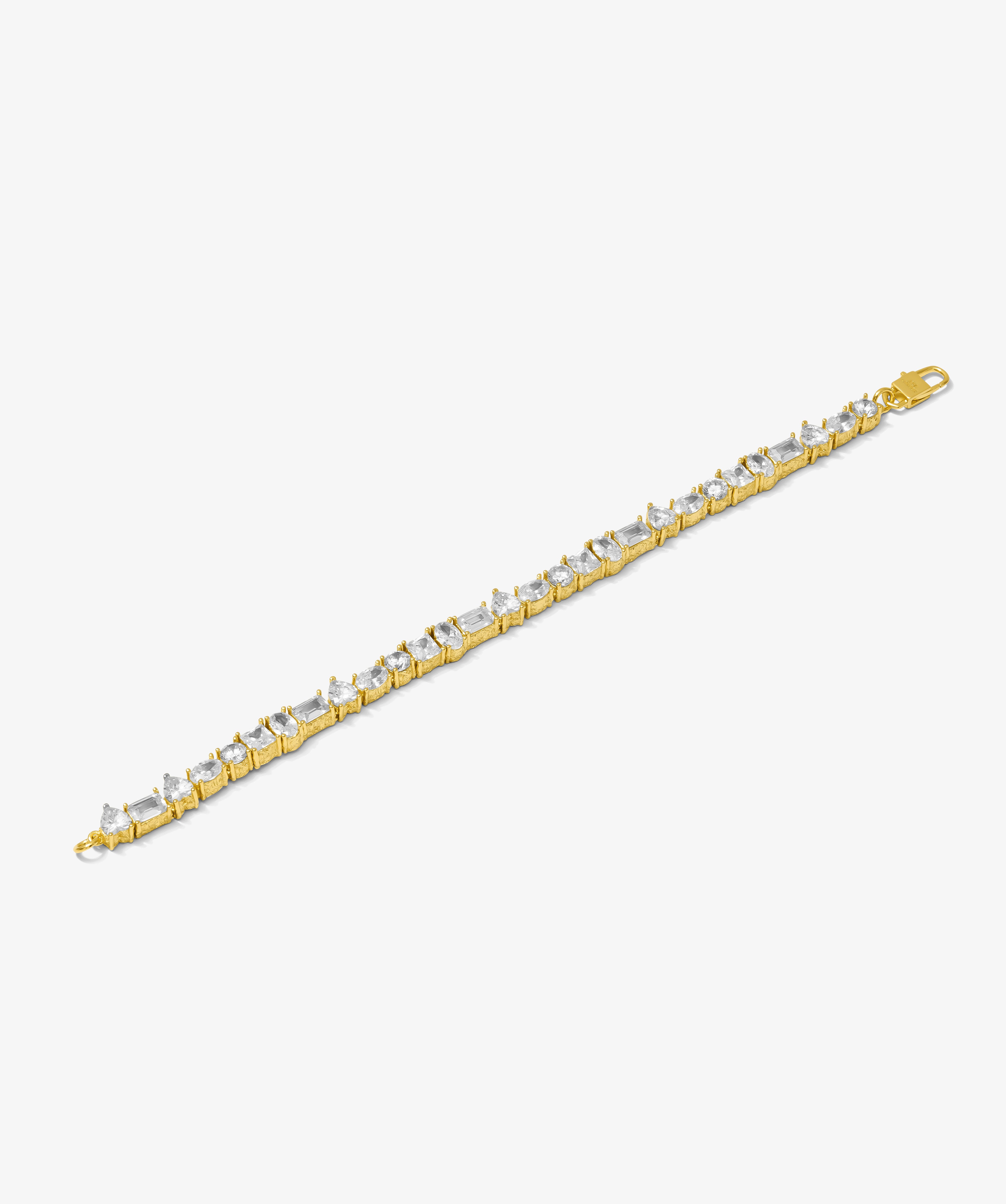 ICED London gold bracelet featuring a line of clear diamonds in a tennis-style setting.