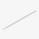 ICED London diamond tennis bracelet with heart-shaped links in silver, elegant jewelry against a white background.