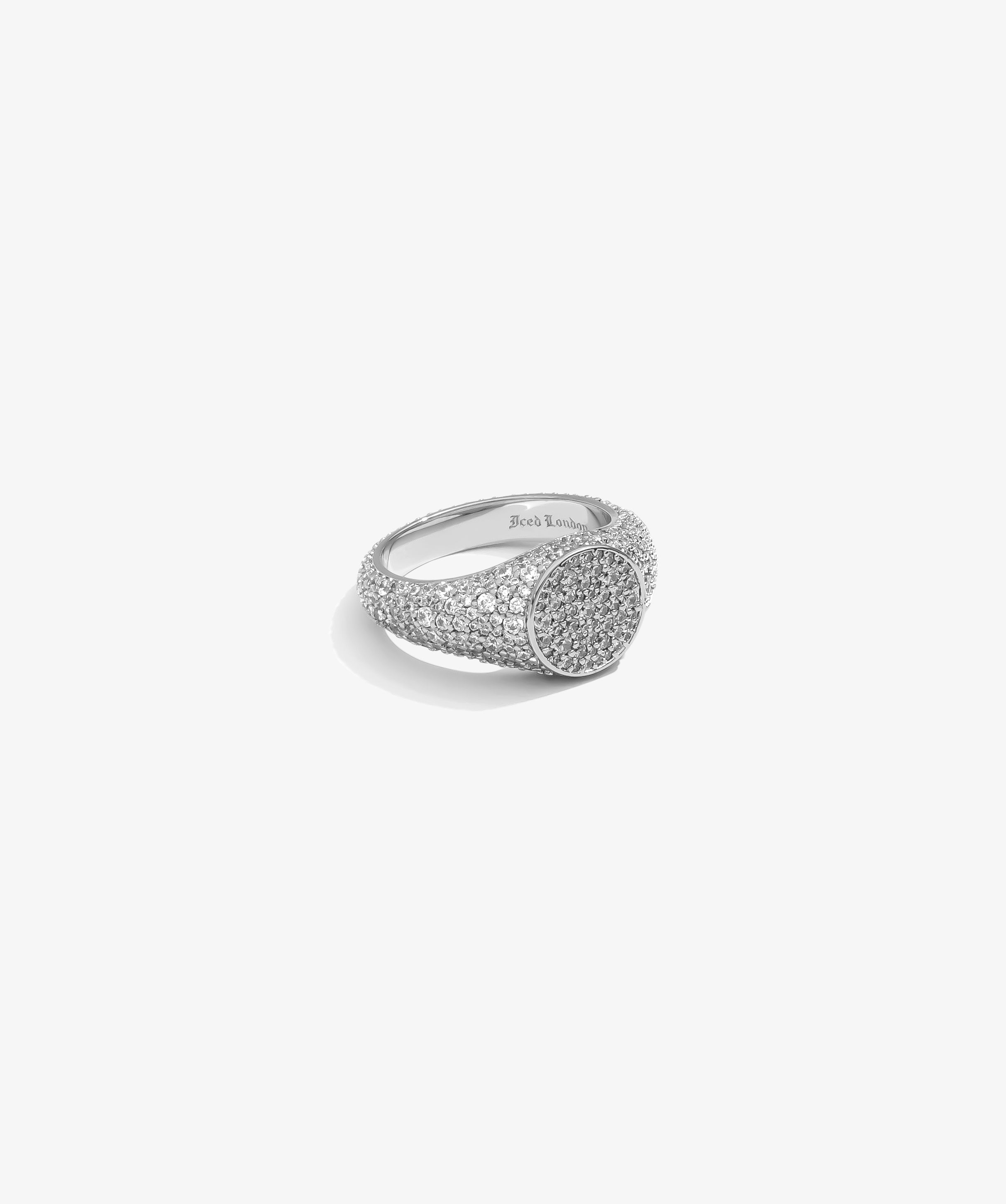 ICED London silver pavé diamond ring with a wide, sparkly band; close-up view highlighting numerous small stones.